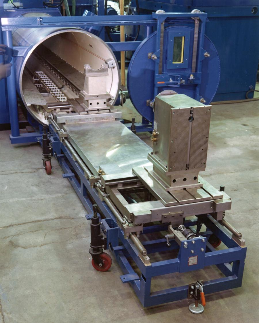 Leybold tube welder with circular chamber, 'roll up' style runout platform.